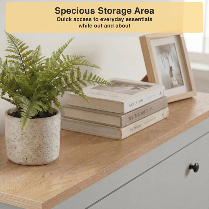 [Grey] Oak-effect top surface styled with potted fern books and photo frame for hallway display