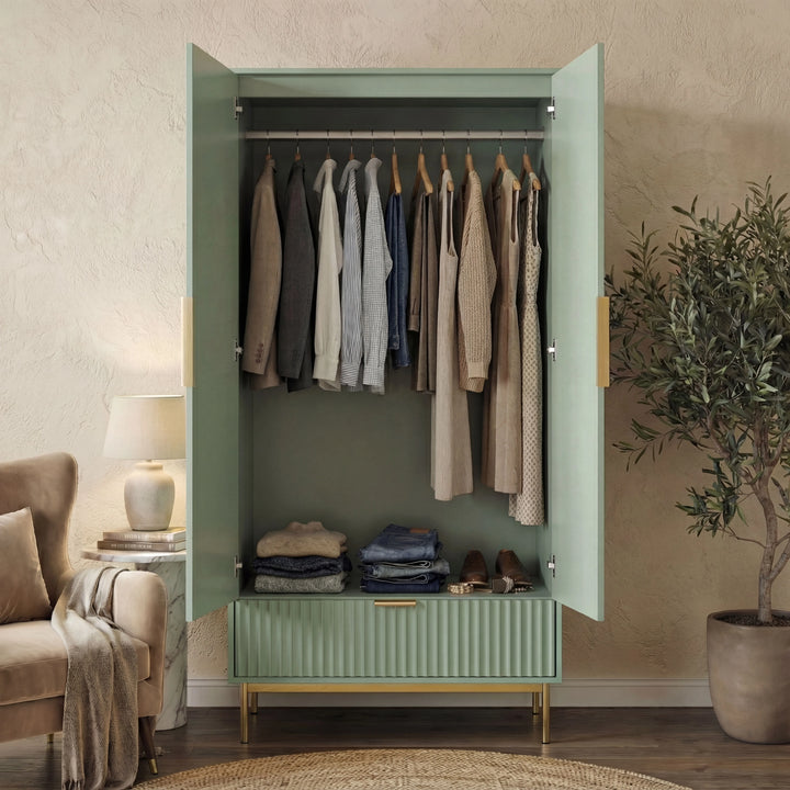 [Sage Green] flutrina double wardrobe with hanging space and a bottom drawer, placed against a wall on a wooden floor