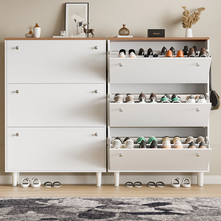 [White] Shoe cabinet side-by-side pair, closed cabinet next to open cabinet showing sloped shoe shelves