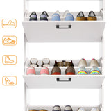 [White] Interior close-up of white slim shoe cabinet with two drawers tipped open showing rows of shoes