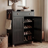 [Black] Hallway black shoe storage cabinet with one slatted door swung open to reveal stacked shoe shelves