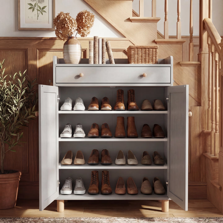 [Grey] Grey shoe storage cabinet shown with doors open exposing four tiers of footwear in a staircase hallway