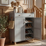 [Grey] Grey shoe storage cabinet placed near a wooden staircase, right door opened to show stacked footwear shelves