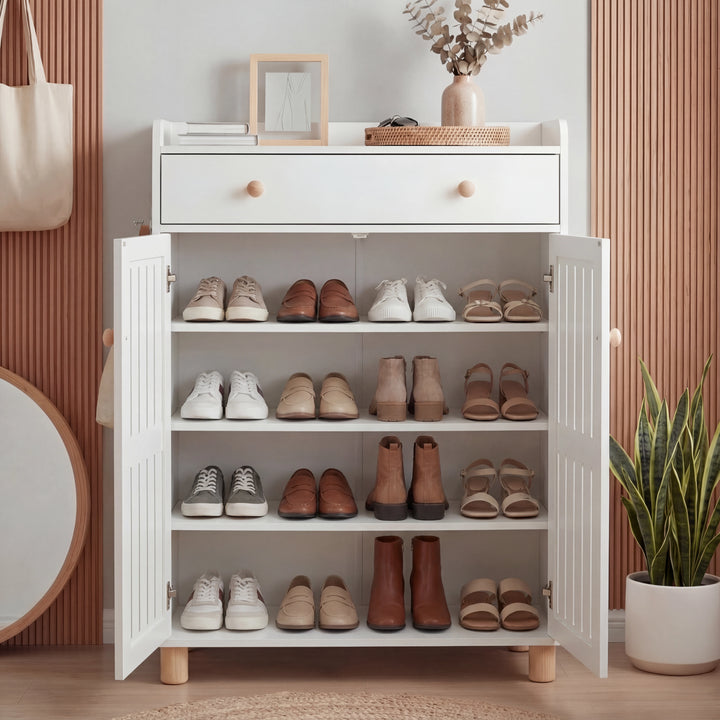 [White] Front view of white shoe storage cabinet, doors swung open to reveal four full shelves of mixed footwear