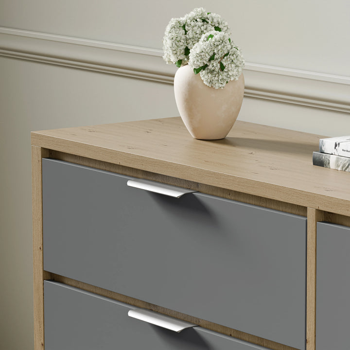 Skova 6 drawer chest of drawers placed against a wall in a bright room with a vase on top