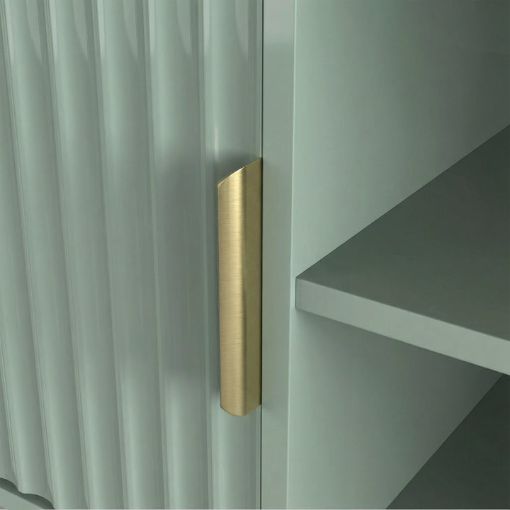 [Sage Green] Close-up of brass flat handle on sage green fluted door of 180cm TV unit, showing vertical groove detail.