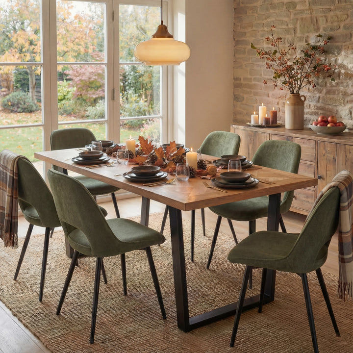 [6 Seater | Green] Autumn dining scene on Aldridge oak parquet table with 6 green chairs and orange foliage decor.