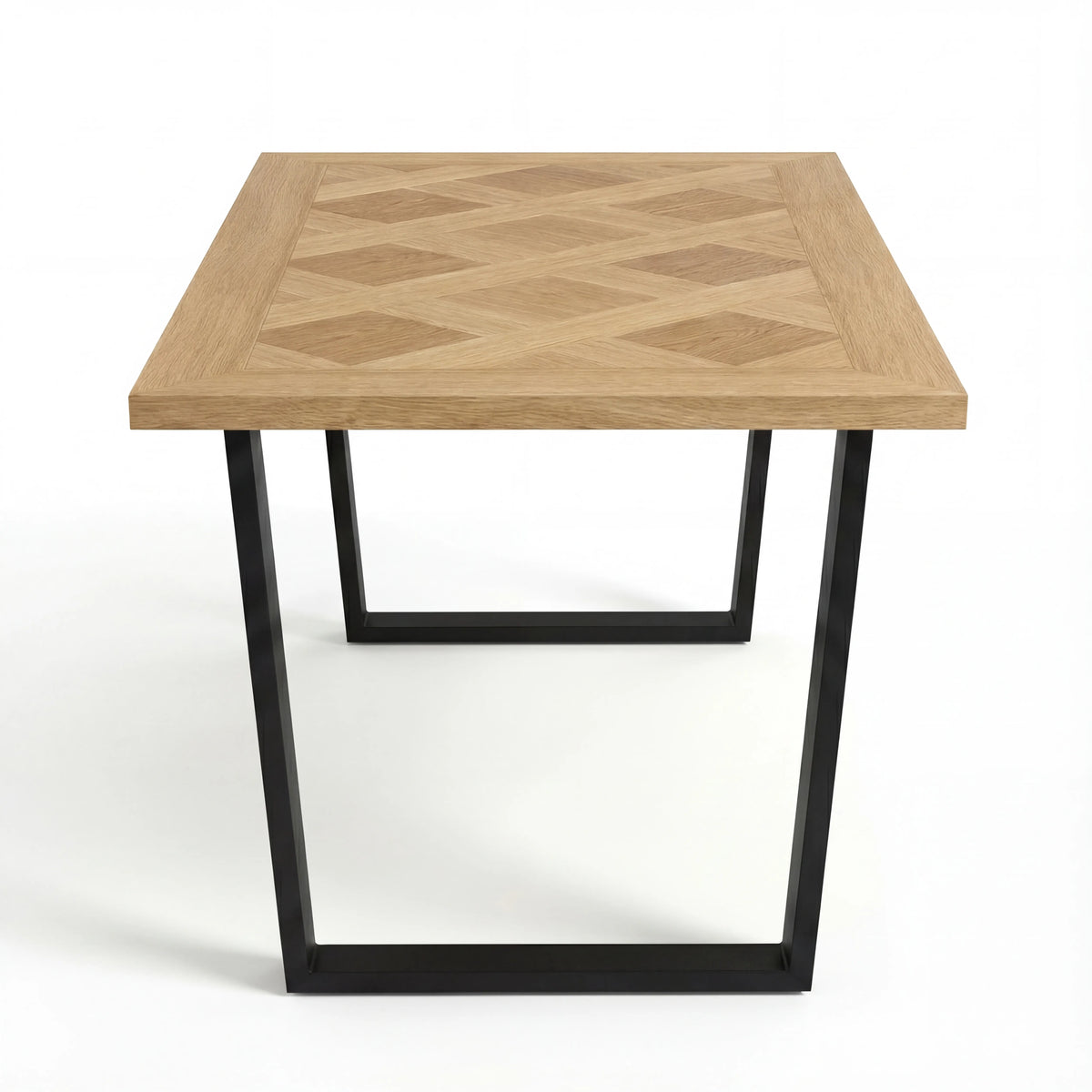 [6 Seater | Green] Aldridge dining table without chairs, corner view showing diamond parquet inlay and black base.