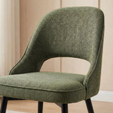 [6 Seater | Green] Front close-up of green Aldridge chair revealing scoop seat curve and back cut-out feature.