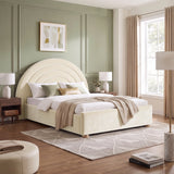 [Beige | King] Wide bedroom view of beige rainbow ottoman bed with curved headboard, rug, side tables and window