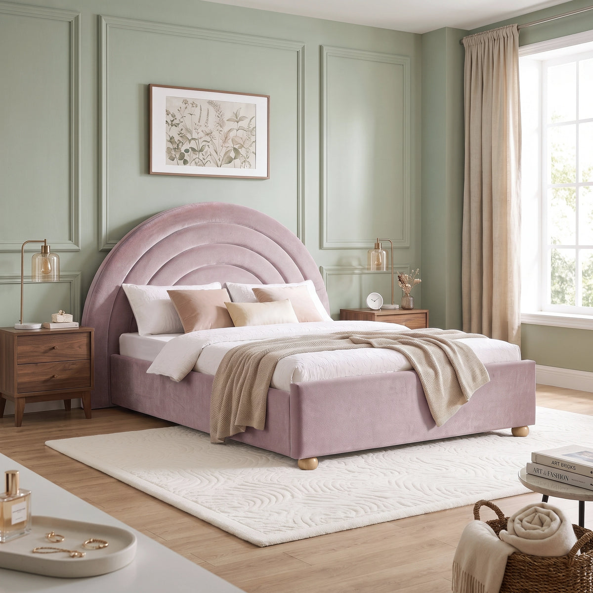 [Pink | King] Wide bedroom view of pink rainbow ottoman bed with curved headboard, rug, side tables and window
