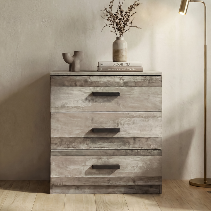 [Ash Grey] Front view of ash grey bedroom drawers against neutral wall with a horizontal black handles