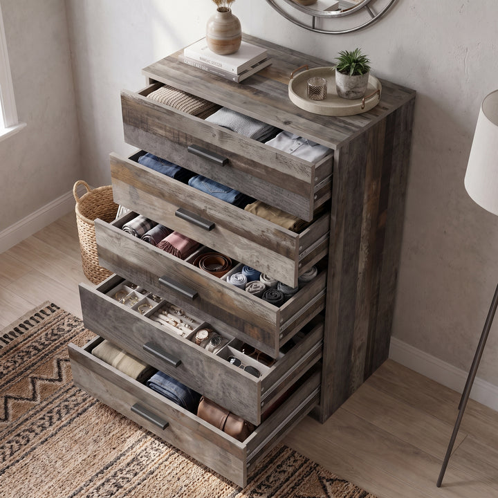 [Ash Grey] High-angle view of the Ash Grey Tall 5 Drawer Chest with all five drawers open.