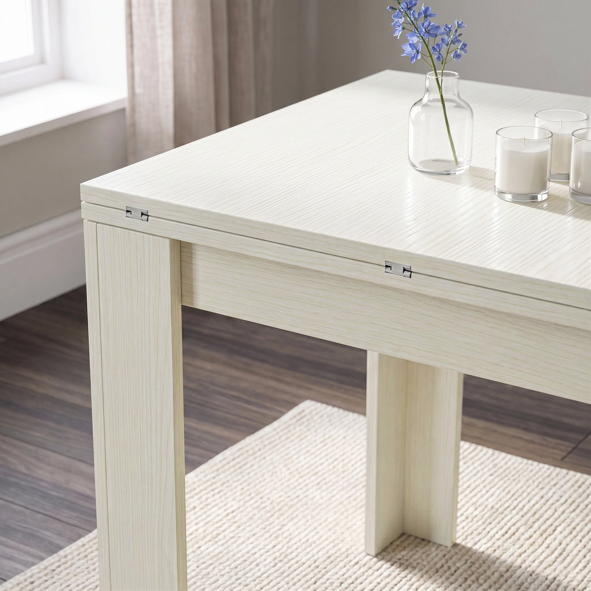 [Ash White] Close-up of the folded tabletop showing visible grain, steel hinges and wide supporting legs