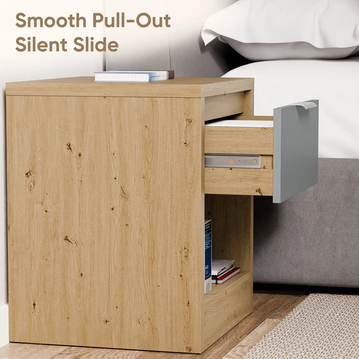 [Oak+Grey] Skova bedside pair runner shot: oak side panel with grey drawer gliding outward beside a fabric bed