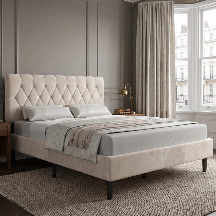 [King | Beige] Velvet Chesterfield bed in a bright styled bedroom with large windows and natural daylight