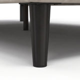 [King | Beige] Velvet bed frame close-up of dark tapered wooden leg showing base support and clearance