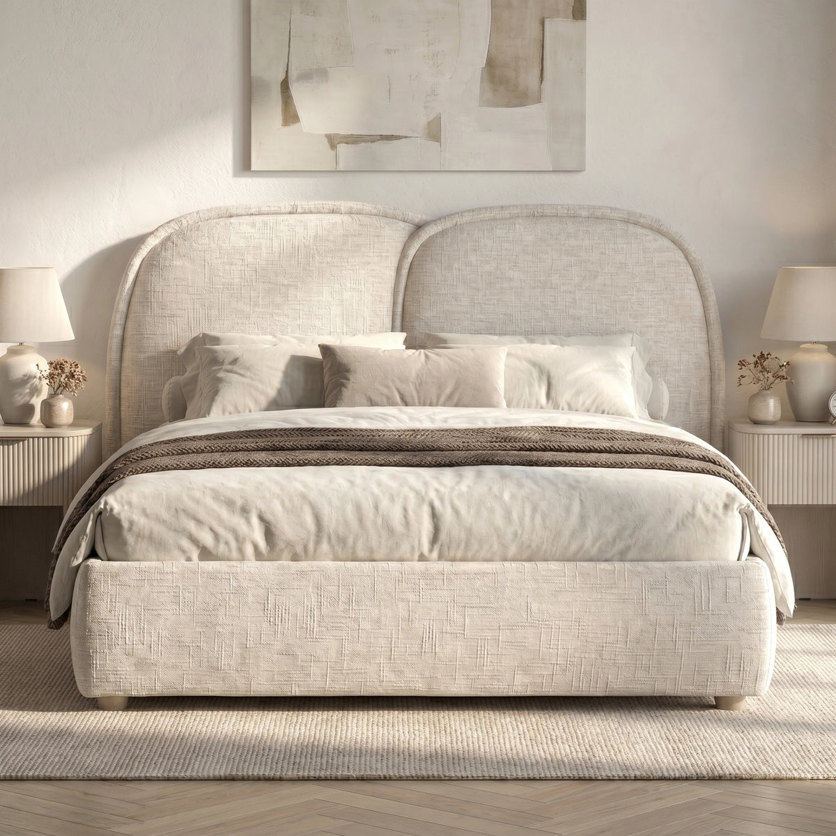 [King | Beige] Embracea bed front-facing in a soft neutral bedroom with twin bedside tables and natural light