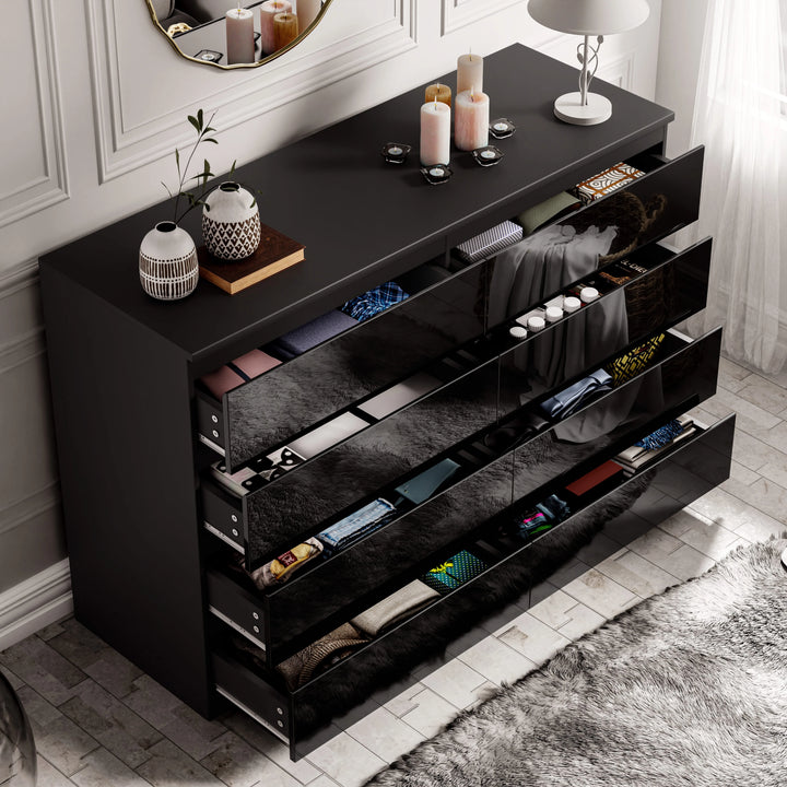 [Black] high gloss wide chest of drawers black corner view with vases and ornaments above frame