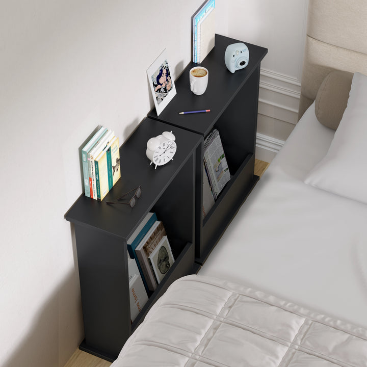 [Walnut + Black] two slim walnut and black side tables aligned at bedside, books in storage compartments