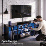 [Black Carbon Fibre] Zelumi TV stand showing open shelf storage with blue LED lighting and person placing gaming controller into the centre compartment