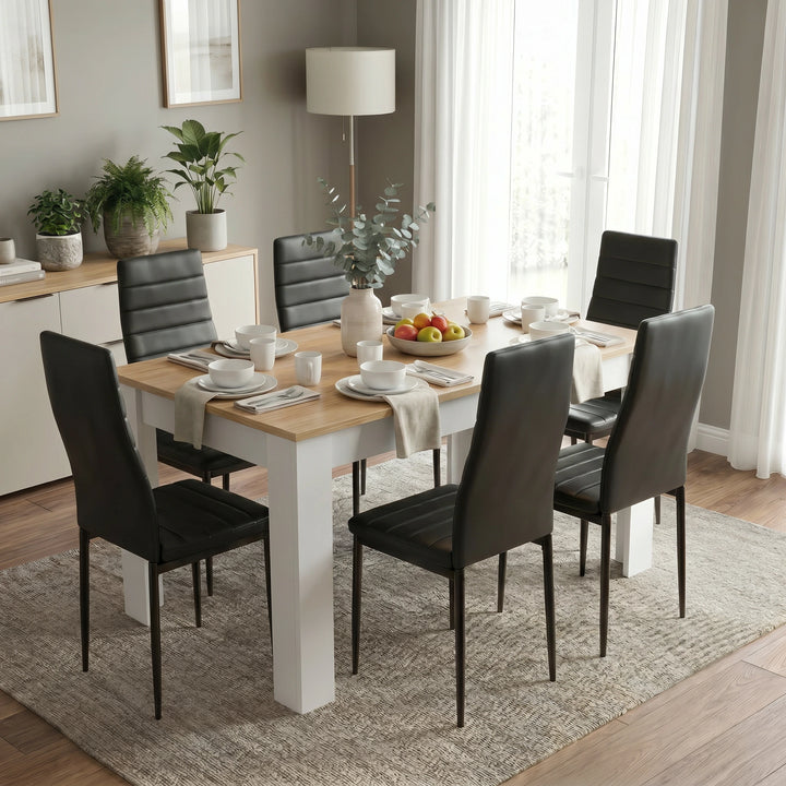 [6 Seater | Black] White & Pine 4-6 Seater Dining Table and Chairs Set showcasing the dining table completely dressed with matching bowls, plates, and a decorative vase