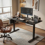 [140cm x 60cm] wide angle of 140cm black electric desk by tall window with chair pulled in and framed art above