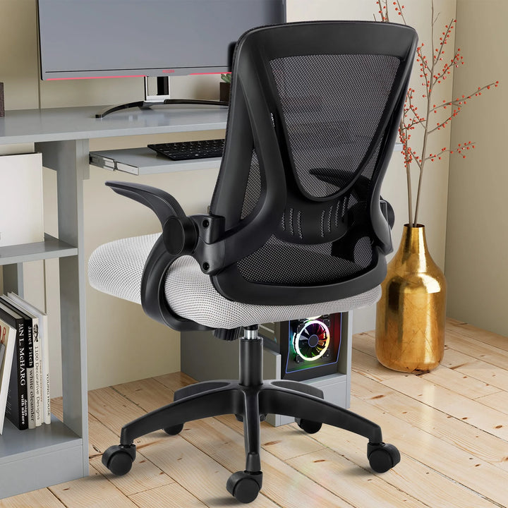 [Black + Grey] Black and grey desk chair with mesh backrest, offering ergonomic support near your PC workstation.