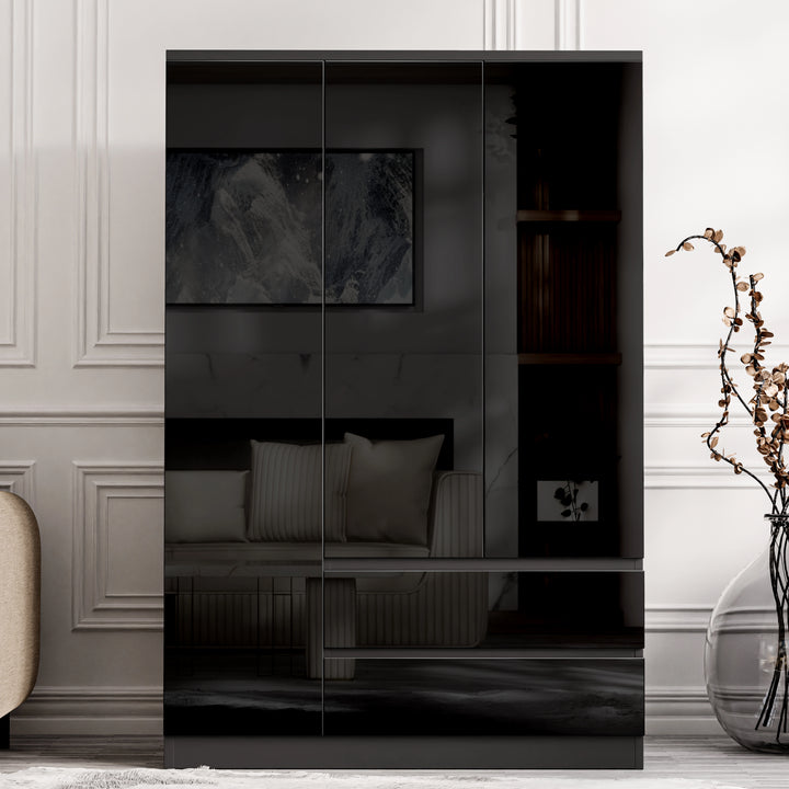 [Black] Black high gloss 3 door wardrobe with drawers head-on, gloss doors reflecting framed bedroom artwork