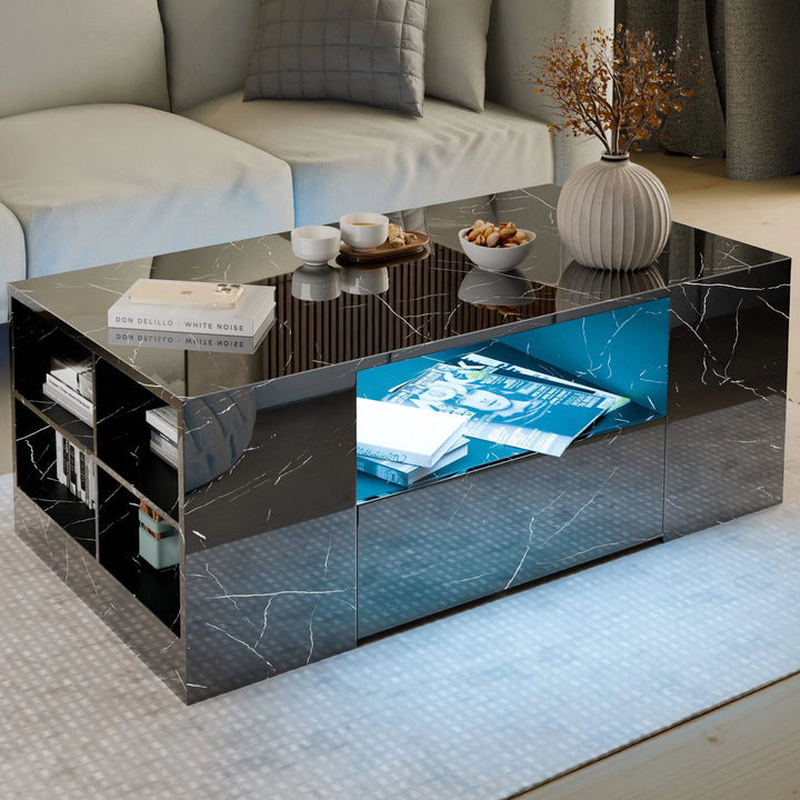 [Black Marble] Angled view of black marble gloss coffee table with two drawers, open side shelves and blue light