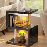 [Black Marble] Black marble side table with stainless poles, yellow LED and hardback books leaning on middle shelf
