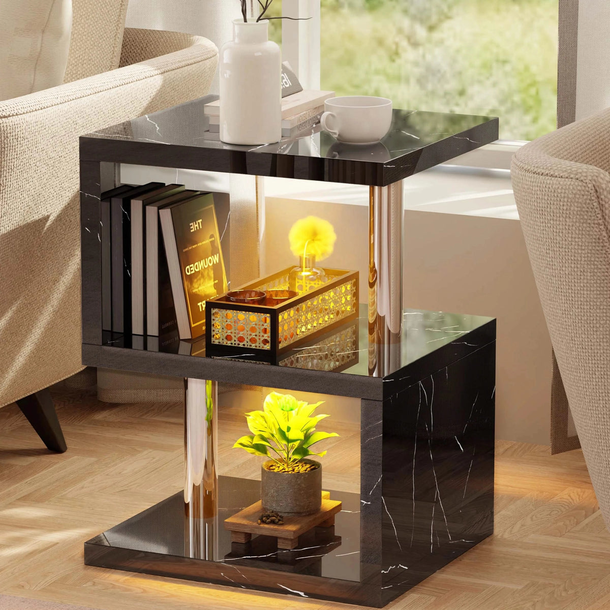 [Black Marble] Black marble side table with stainless poles, yellow LED and hardback books leaning on middle shelf