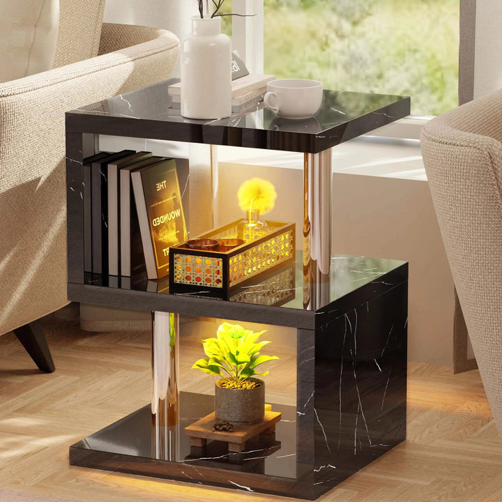 [Black Marble] Black marble side table with stainless poles, yellow LED and hardback books leaning on middle shelf
