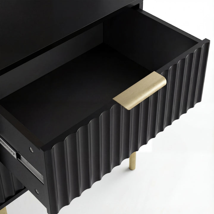 [Black] Open black flutrina bedside drawer revealing flat painted base with brushed gold bar handle on fluted front