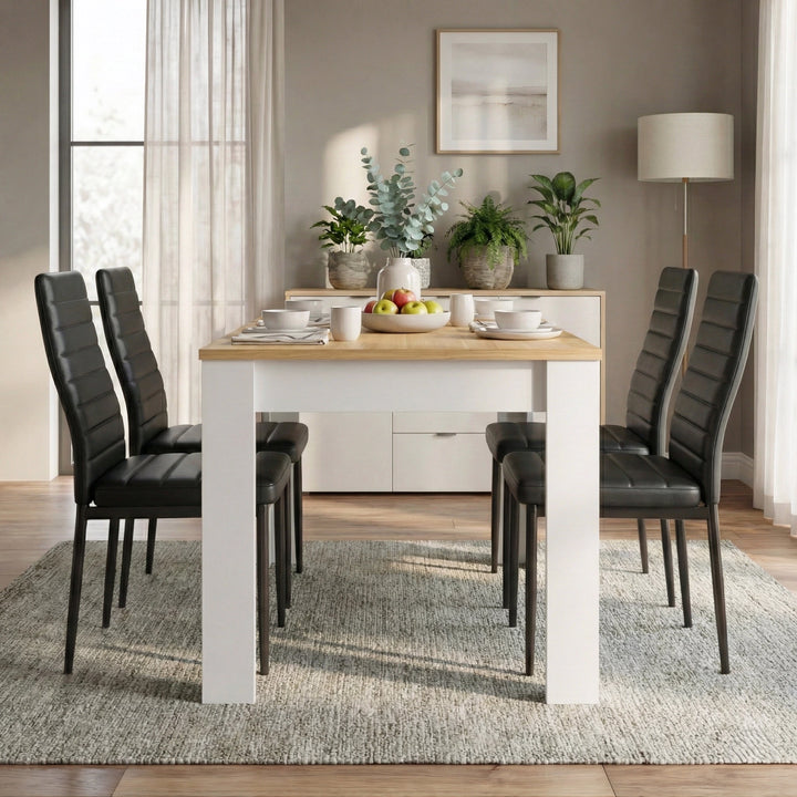 [4 Seater | Black] Dining Table and Chairs Set with four black faux leather chairs around a pine-top table in a neutral styled dining room with plants