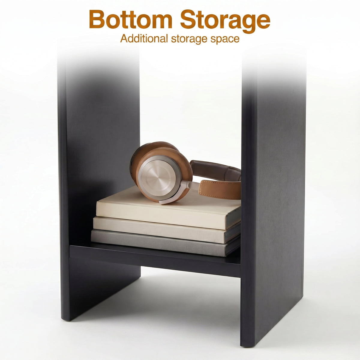 [Black] shelf with books and a pair of headphones, labeled 'Bottom Storage Additional storage space'.
