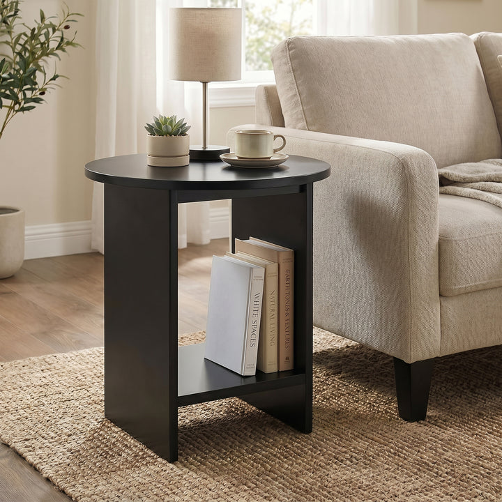 [Black] Small Round Side Table with Shelf Living Room beside cream sofa with lamp and succulent on top and upright books stored on lower shelf