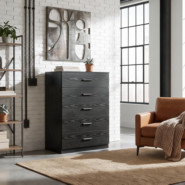 [Black] Wide lifestyle view of the Black Tall 5 Drawer Chest styled in a modern interior.