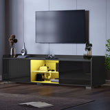 [Black] black gloss LED TV cabinet door open exposing yellow internal lighting and stored amplifier