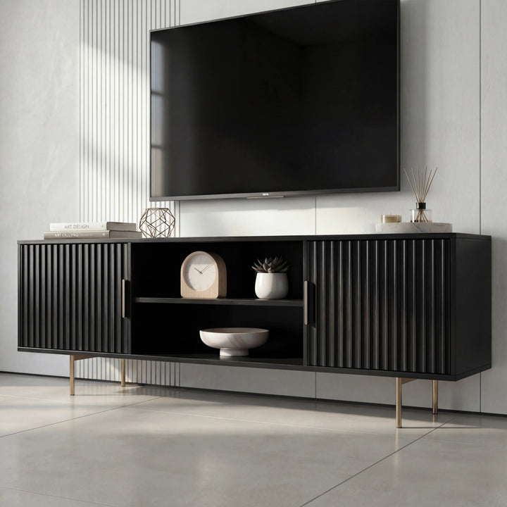 [Black]   Black 140cm TV unit at three-quarter angle, fluted door fronts and open centre with mantel clock and bowl