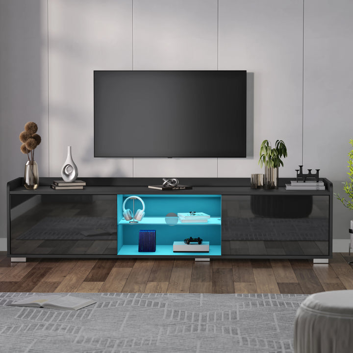 [Black] Front shot of black TV unit with blue interior LED, decor on top, beige flooring below
