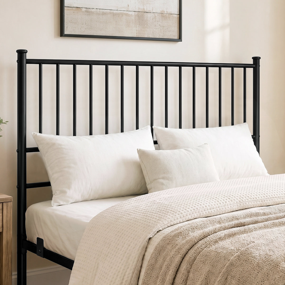 [Black | King] Metal bed close-up view of tall vertical-bar headboard with white pillows & black-and-white abstract wall art.
