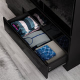 [Black] Open drawer detail of 3 door wardrobe revealing smooth-glide runner and folded garments inside.
