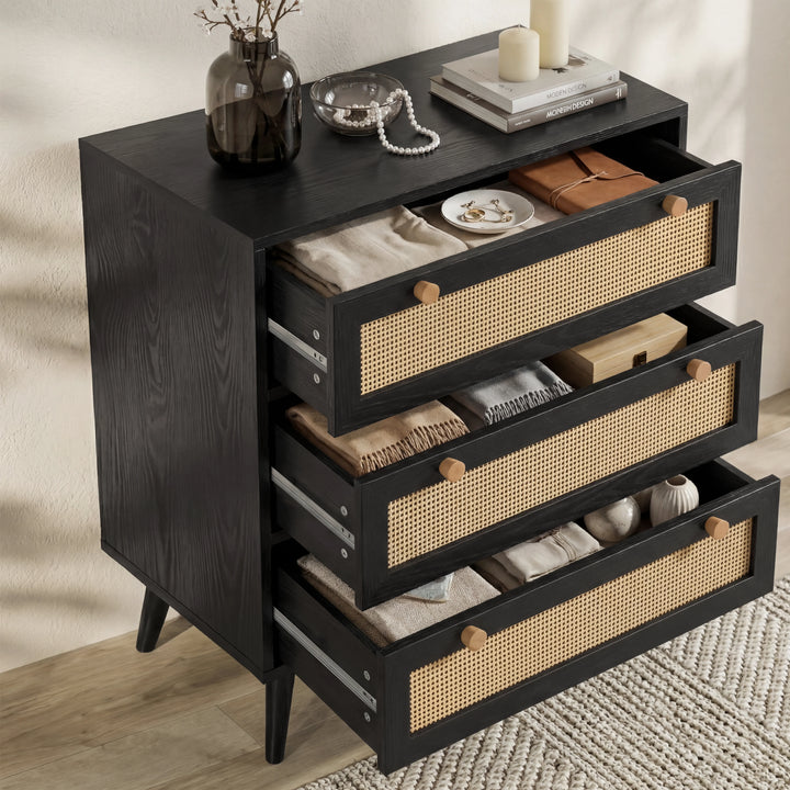 [Black] Wovena rattan bedroom furniture set chest with all three drawers open showing knitwear and accessories inside