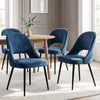 [Blue | Set of 4] Four curved-back dining chairs arranged around a round wood table with a vase and black metal legs.