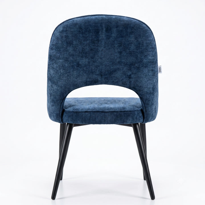 [Blue | Set of 4] Rear view of the comfy dining chair with rounded open back, piped seat and four sturdy black metal legs.