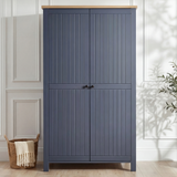 [Blue] Linra bedroom furniture set wardrobe shown closed with two grooved panel doors and black knob handles