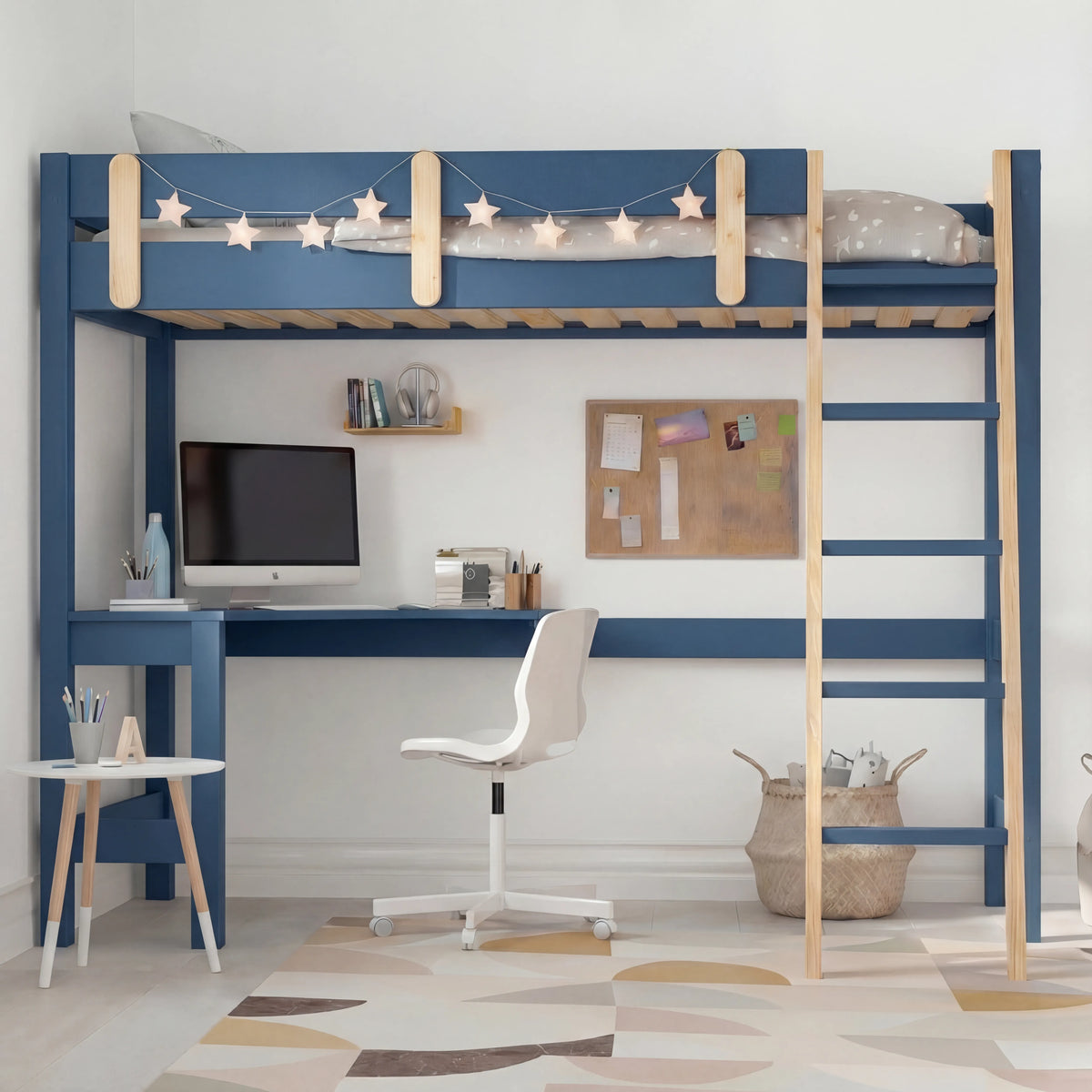 [Blue + Pine] Kids bunk bed front view showing built-in desk and chair below and star-print bedding on upper platform