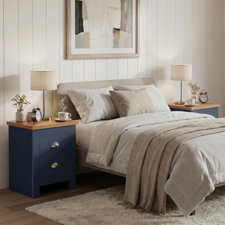 [Blue] Neatly arranged bedroom with a bed, nightstands, and decor items.