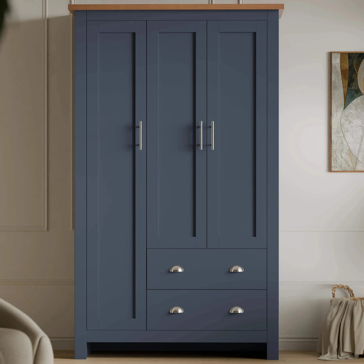 [Blue] Dark blue wardrobe from Shaker bedroom furniture set styled beside artwork and woven basket